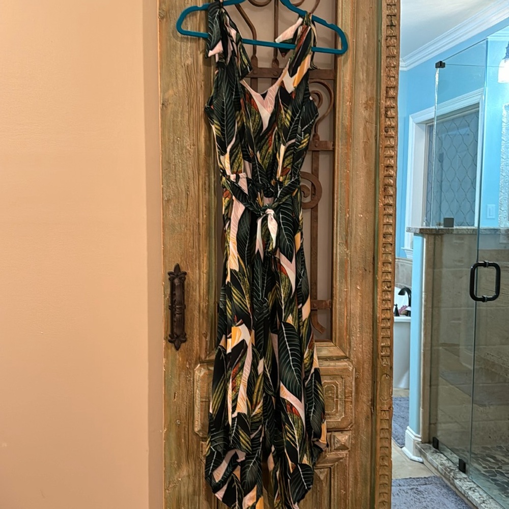 Tropical leaf print cropped jumpsuit with pockets